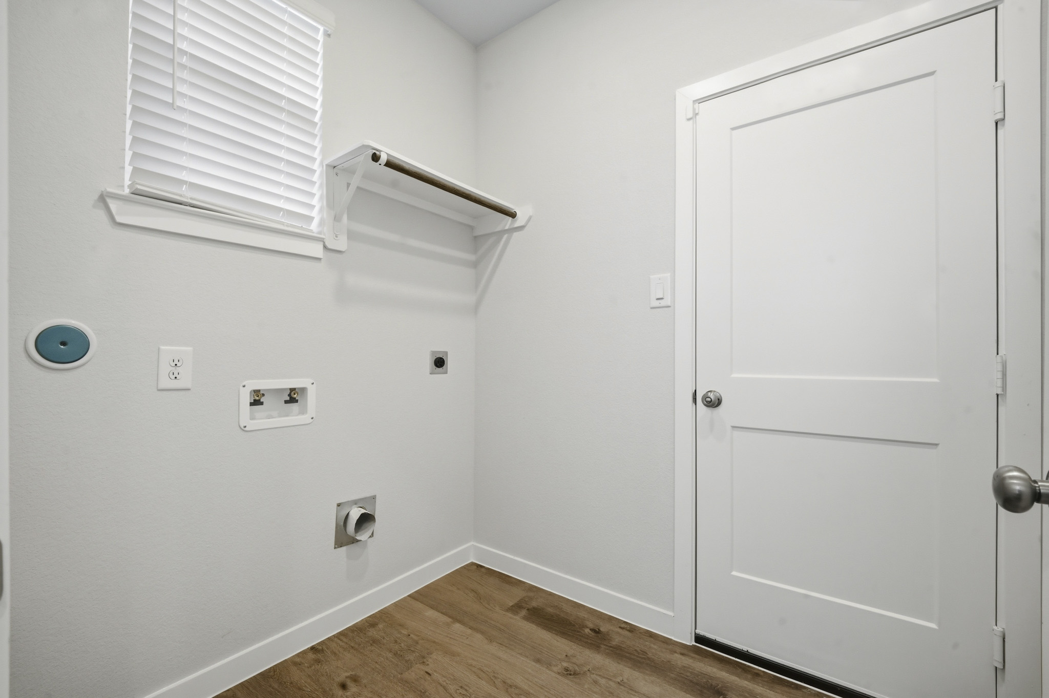 A white door in a room.