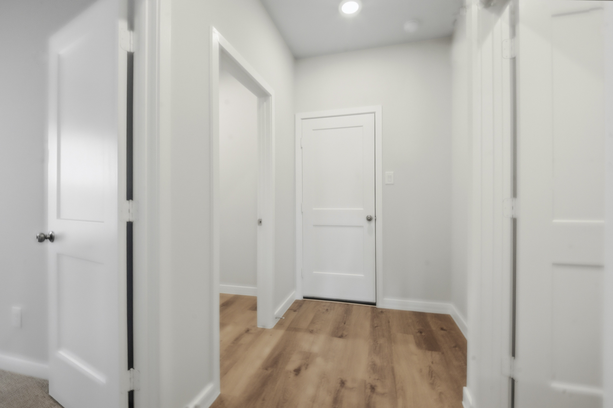A room with white doors.