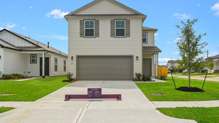 A house with a driveway.