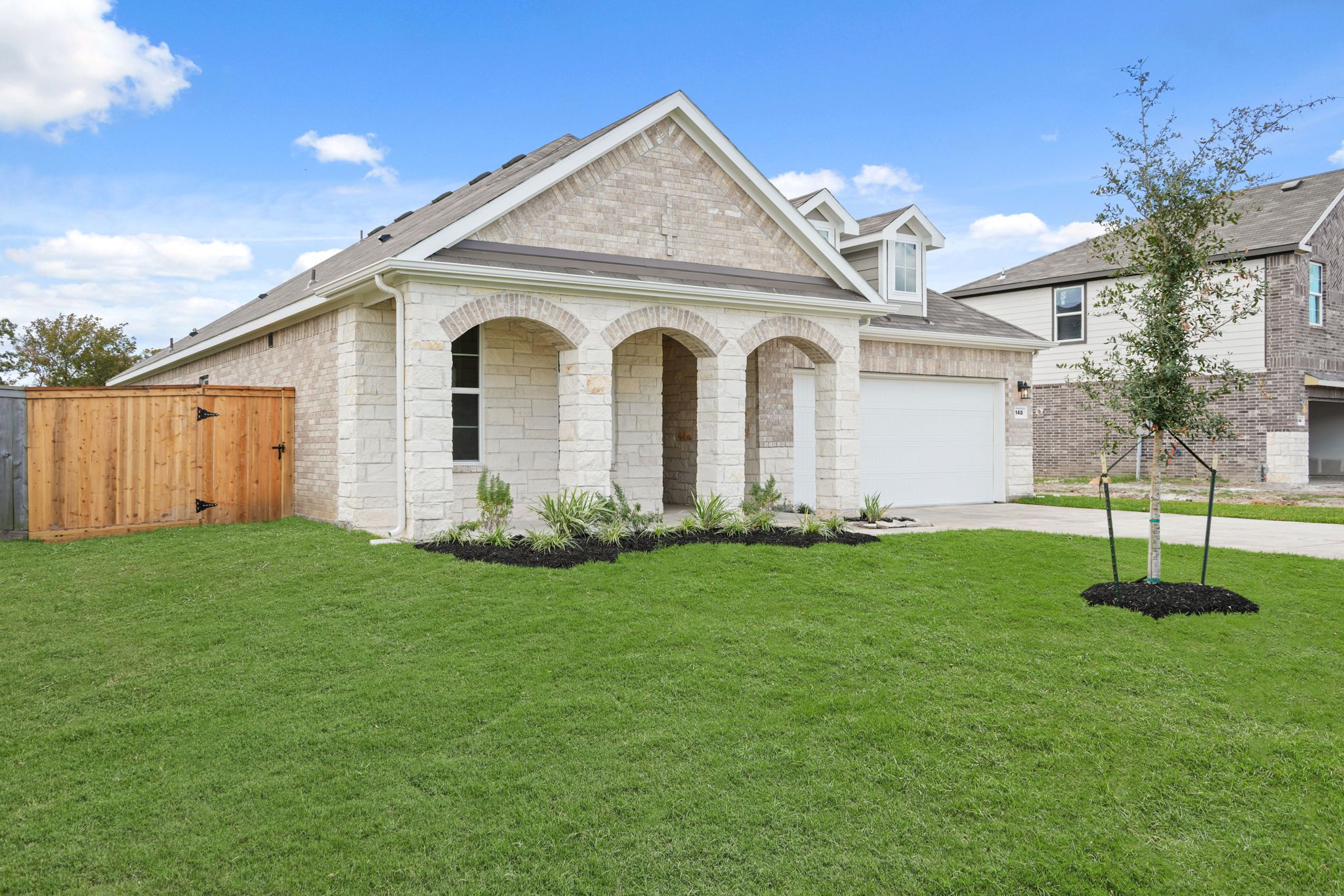 A house with a large front yard.