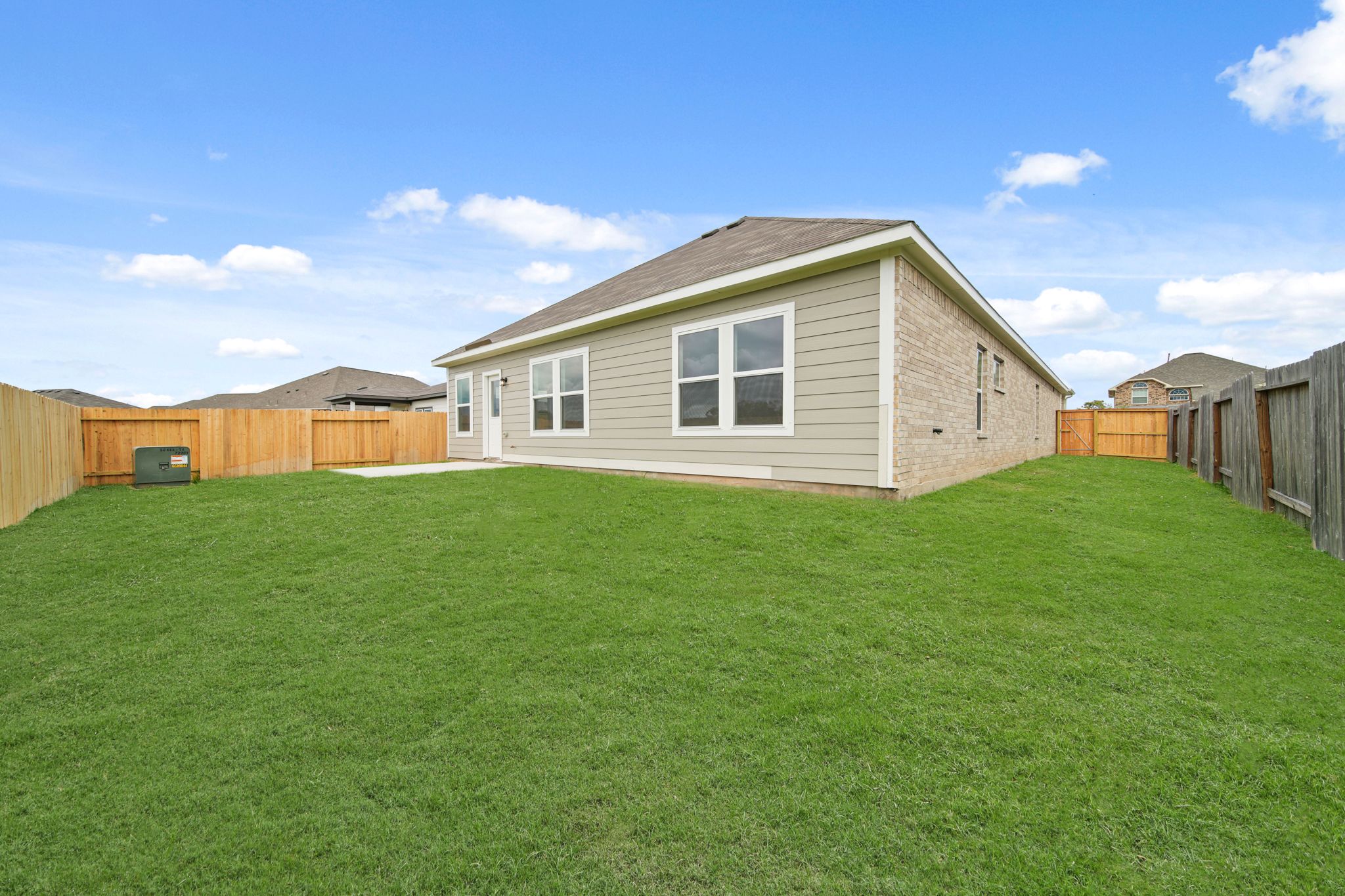 A house with a fence around it.