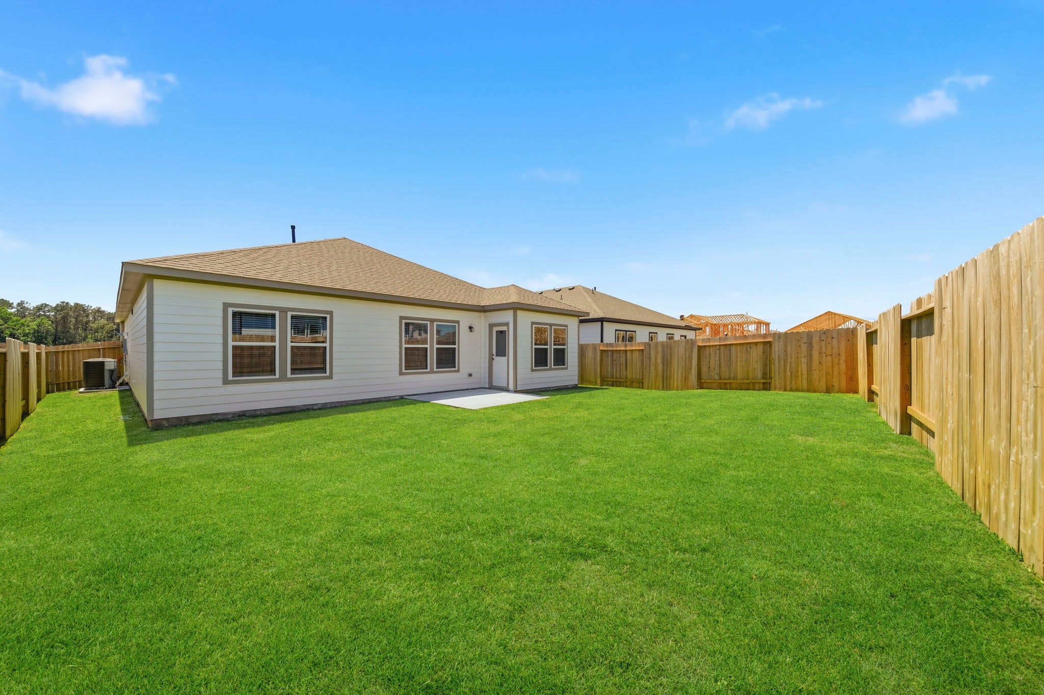 A house with a fence around it.