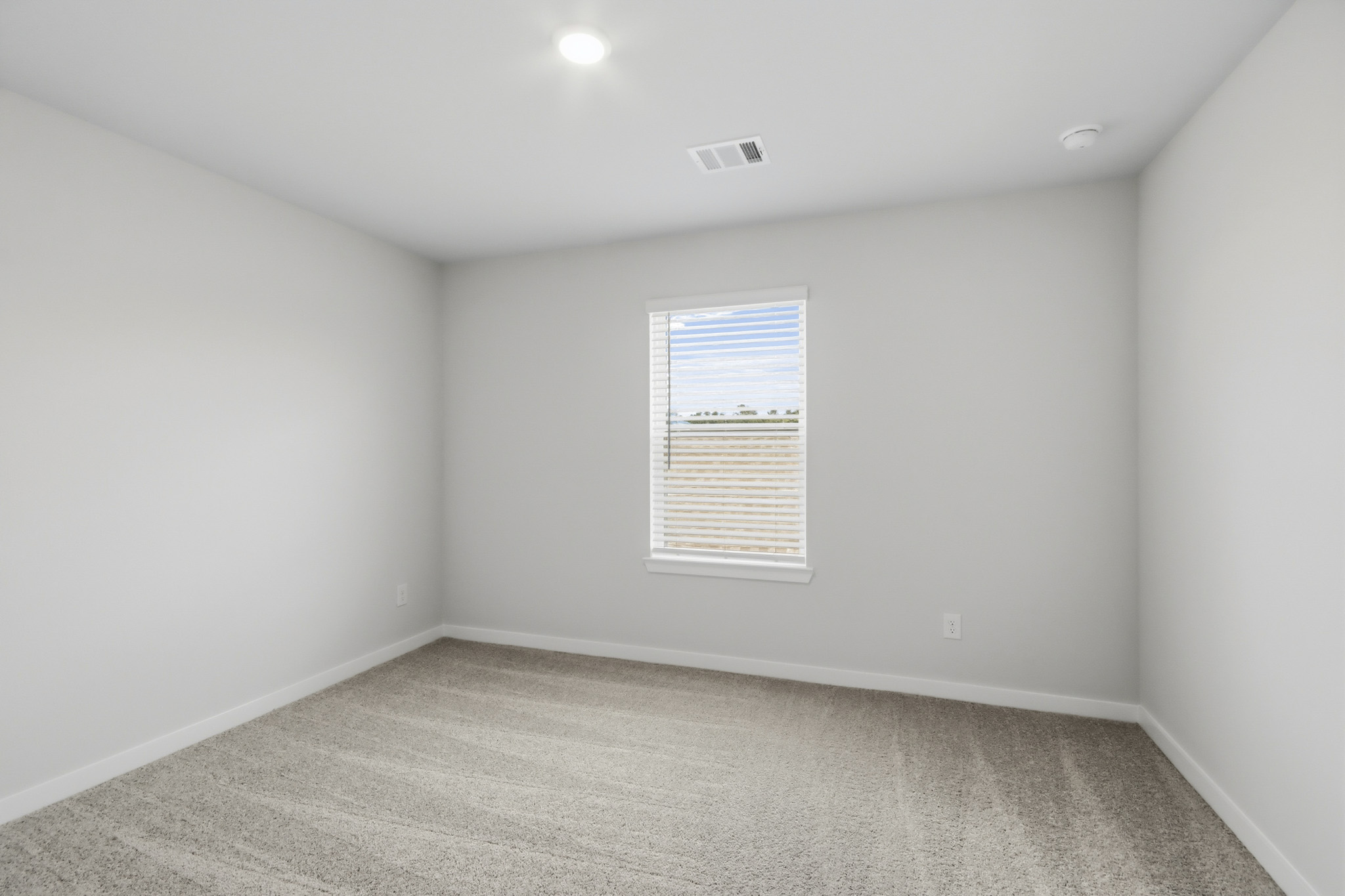 A room with a door and a window.