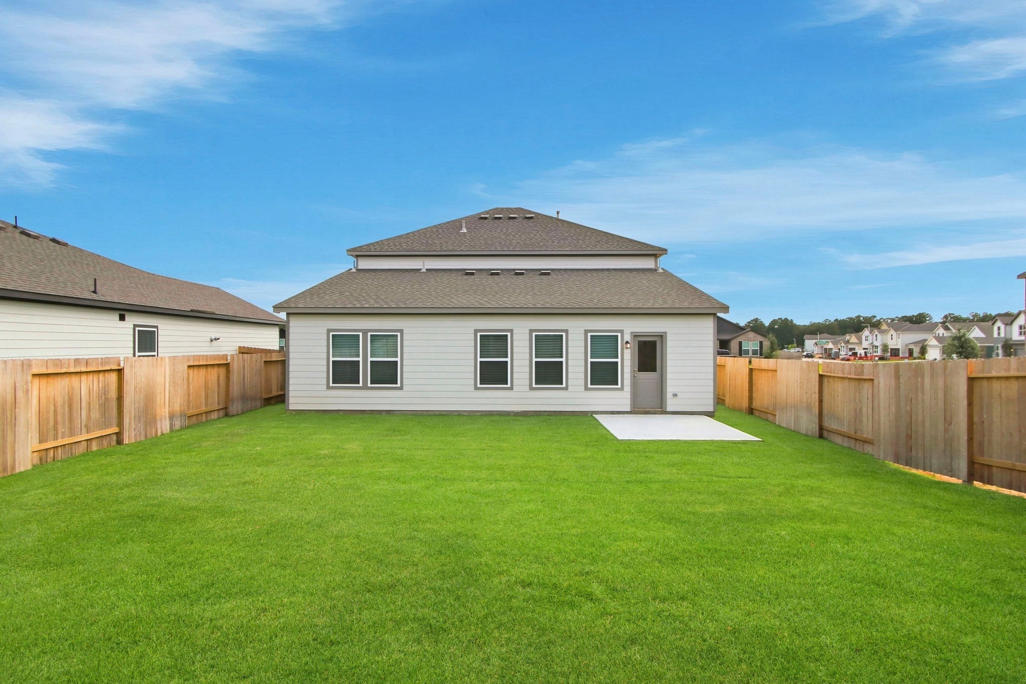A house with a fence around it.