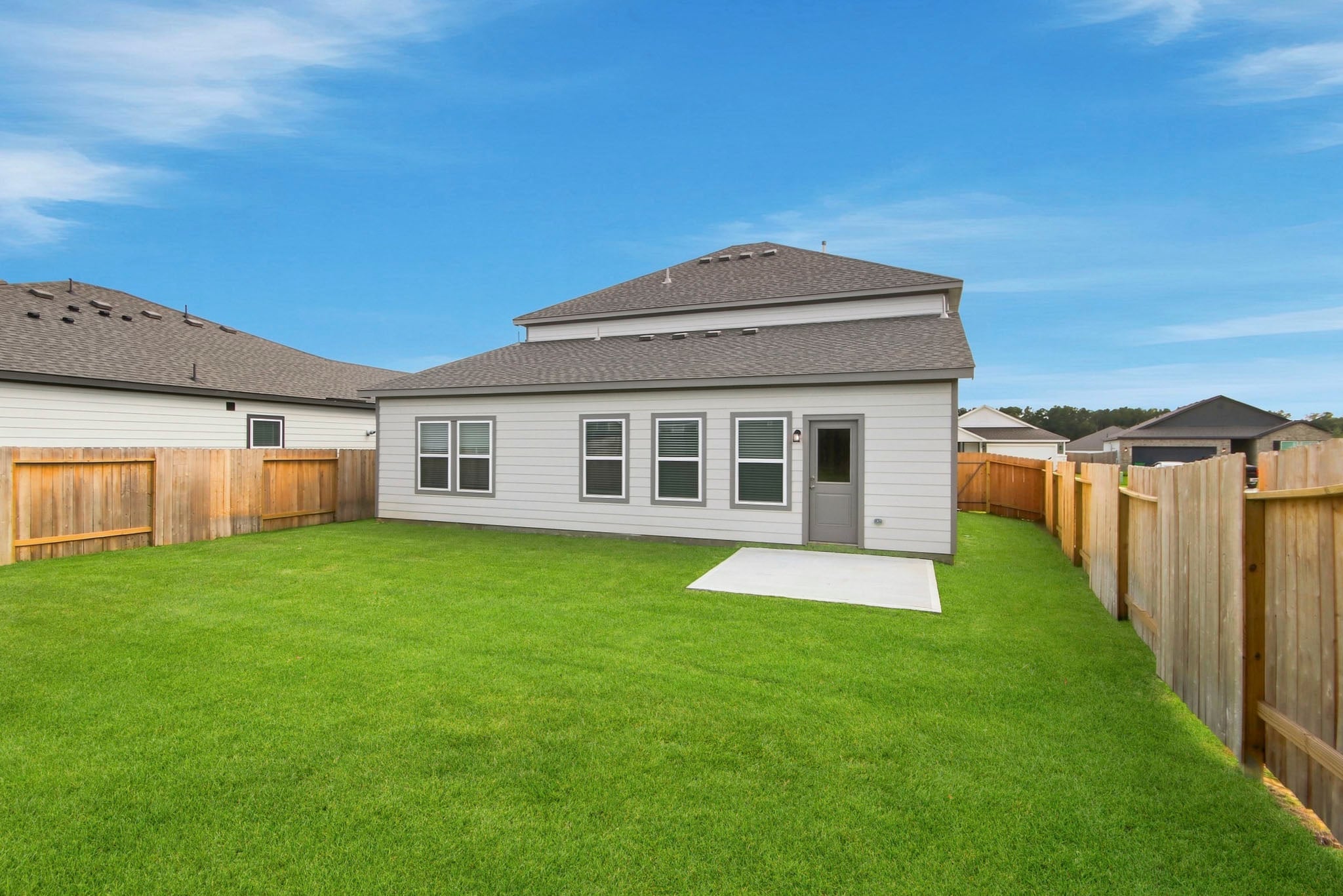 A house with a fence around it.