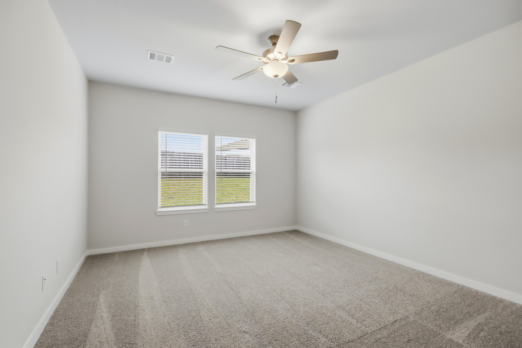 A ceiling fan in a room.