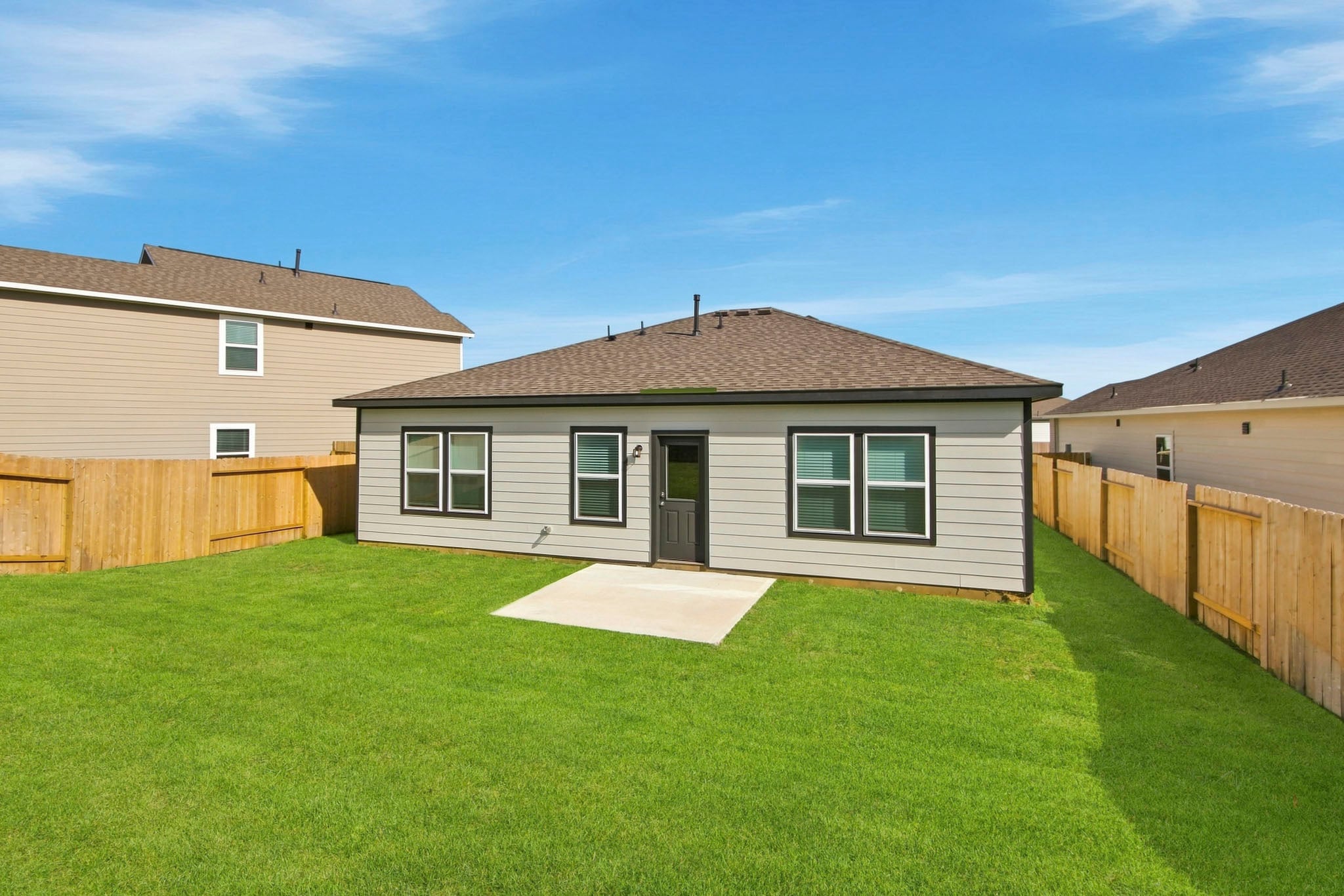 A house with a fence around it.