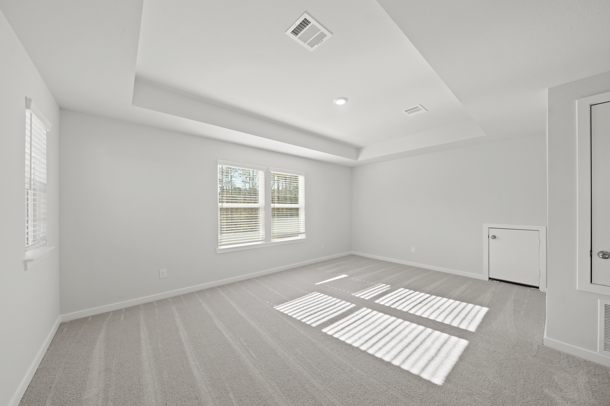 A room with a rug and a rug.