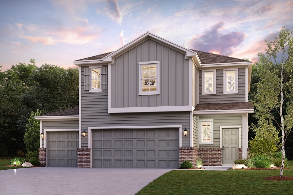 A grey house with a garage.