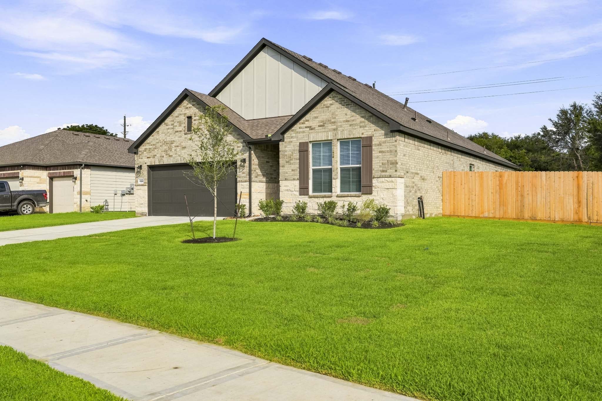 A house with a green lawn.