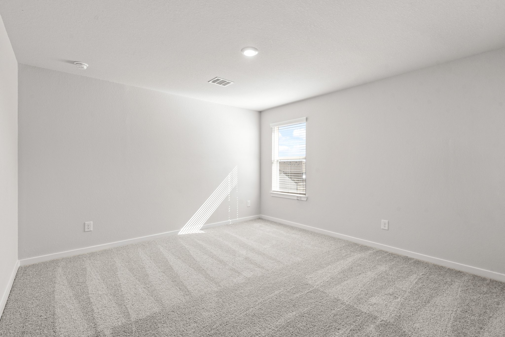 A room with a staircase.