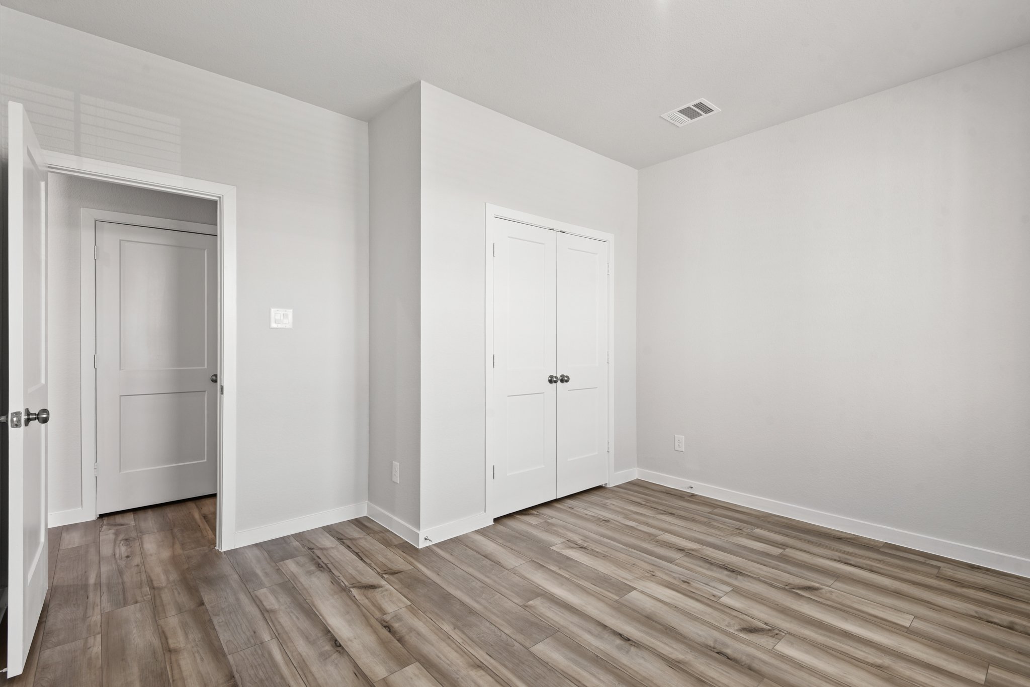 A room with white doors.