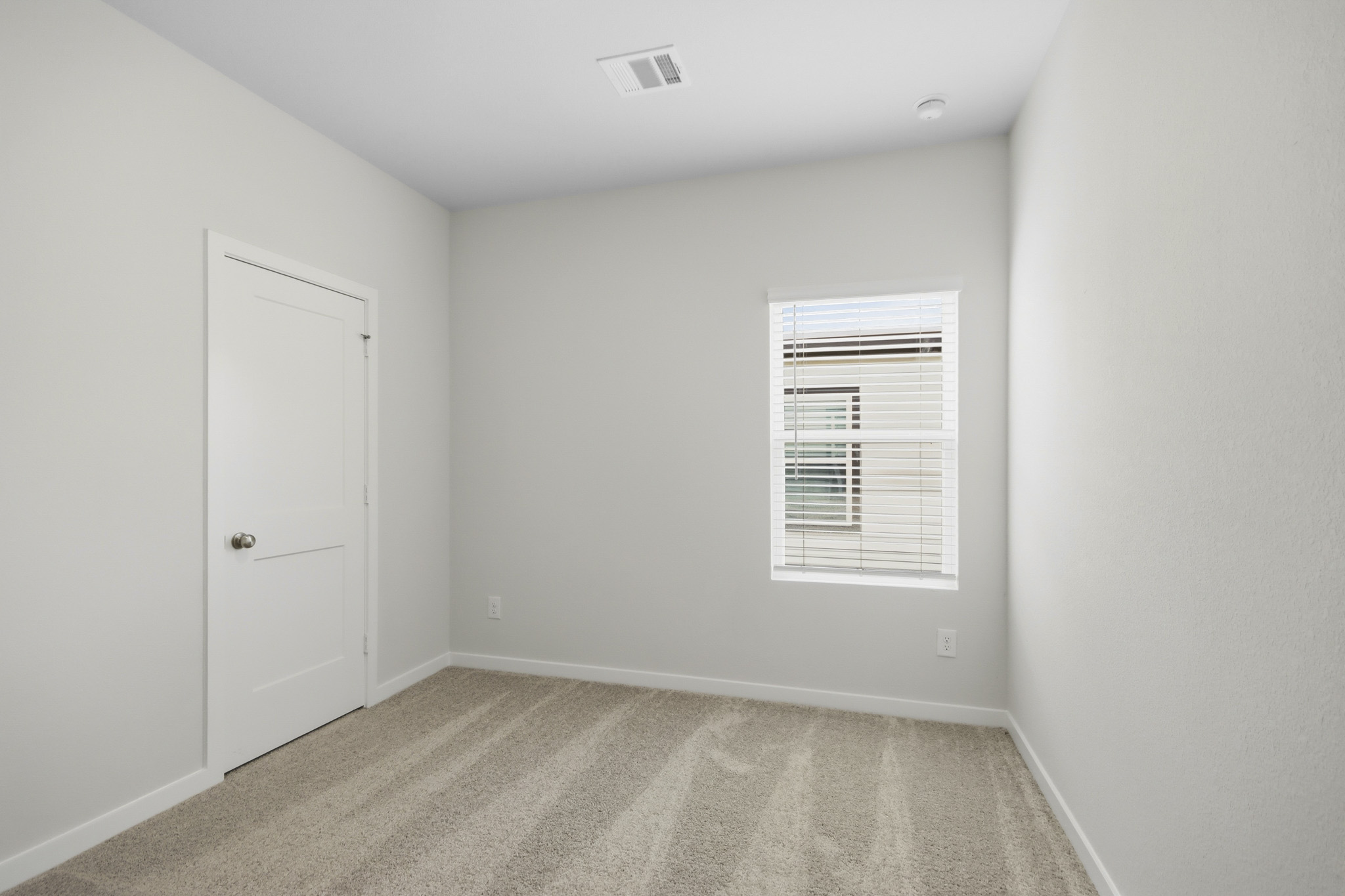 A room with white doors.