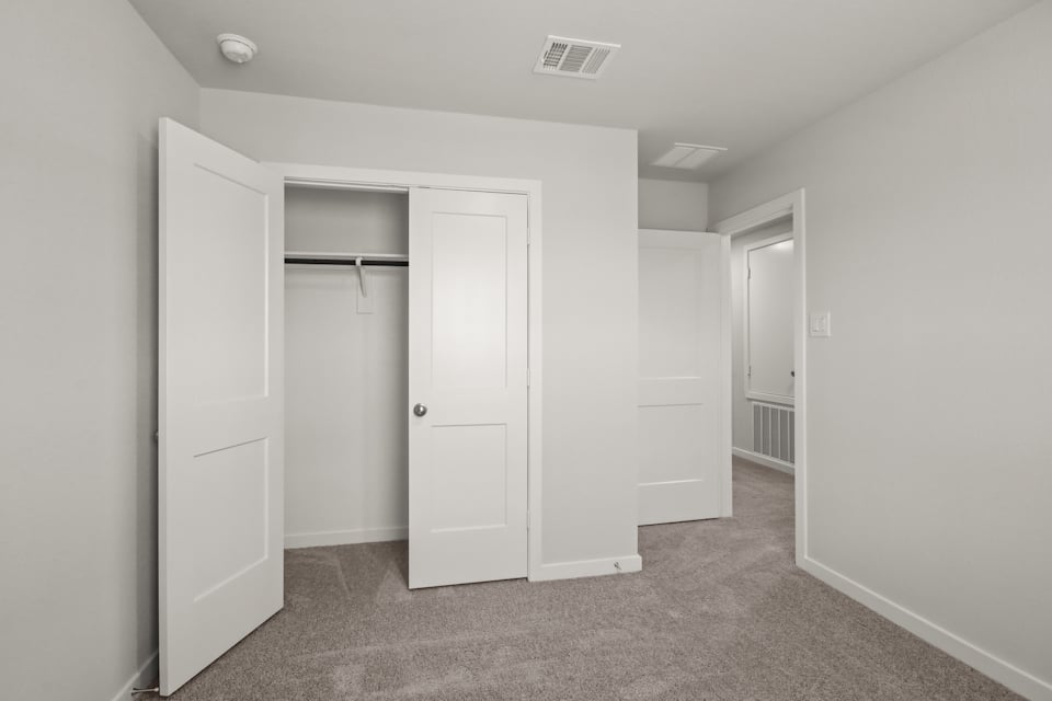 A room with white doors.