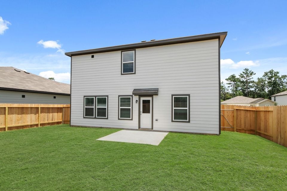 A house with a fence around it.