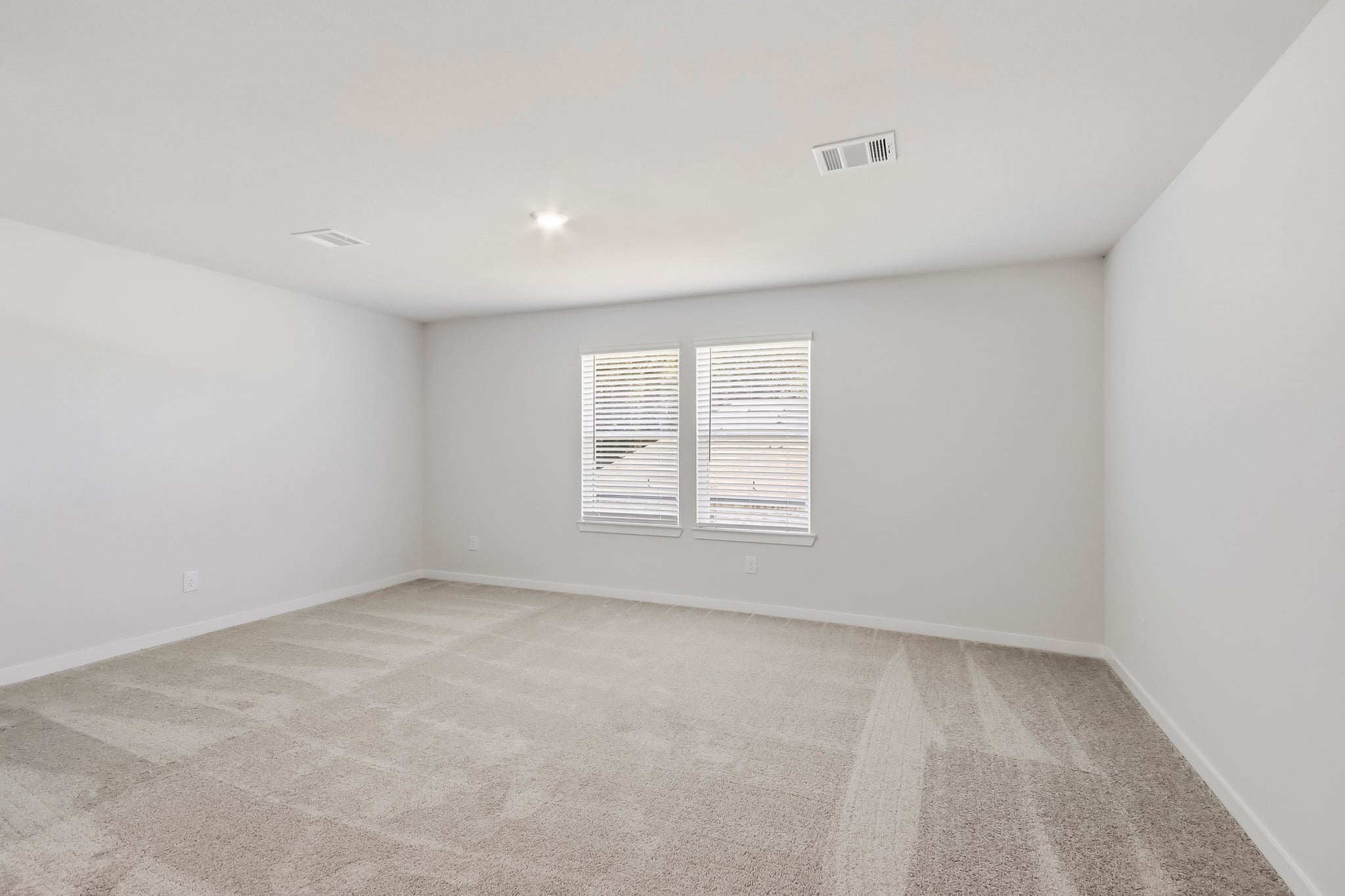 A room with a door and a window.