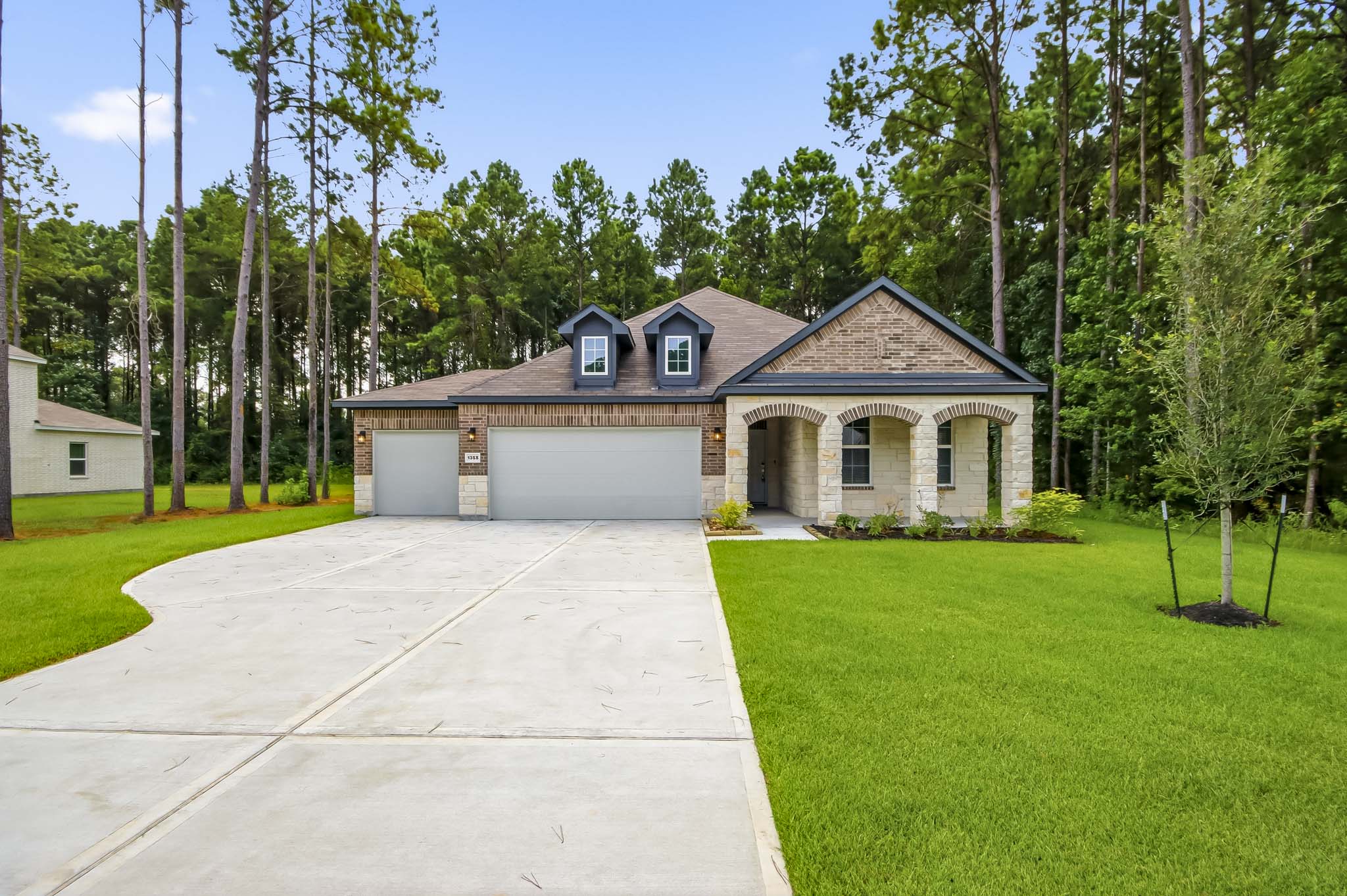 A house with a driveway.