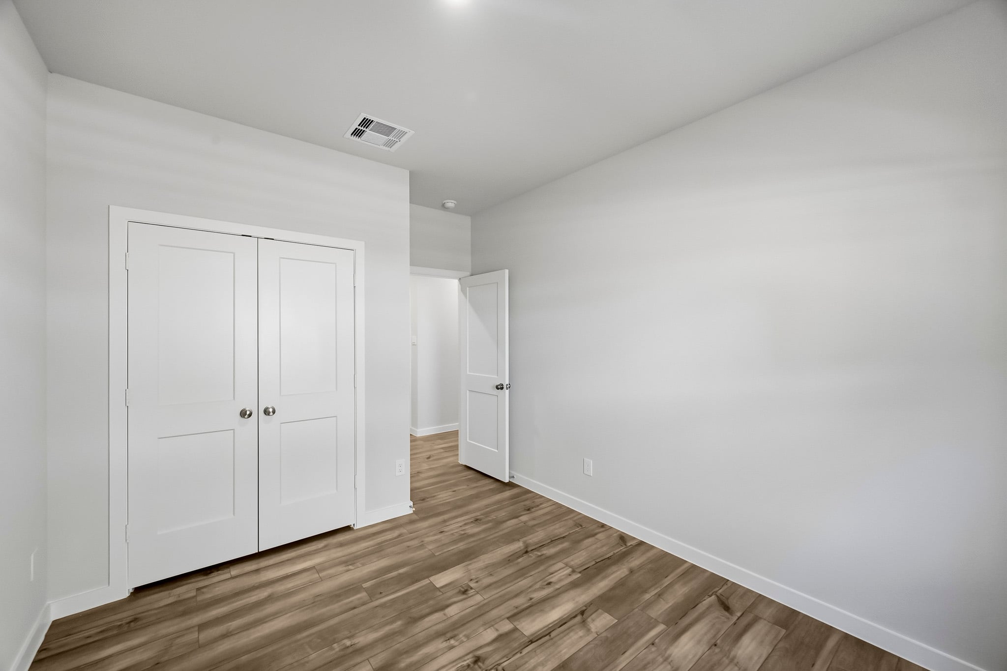 A room with white doors.