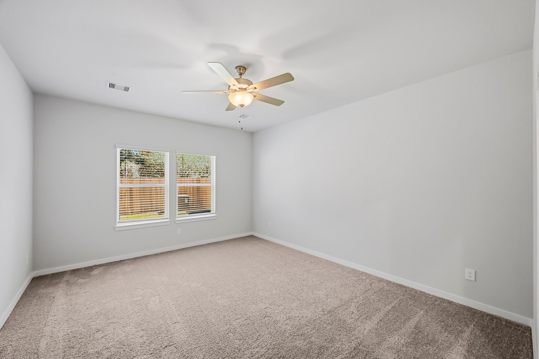 A ceiling fan in a room.