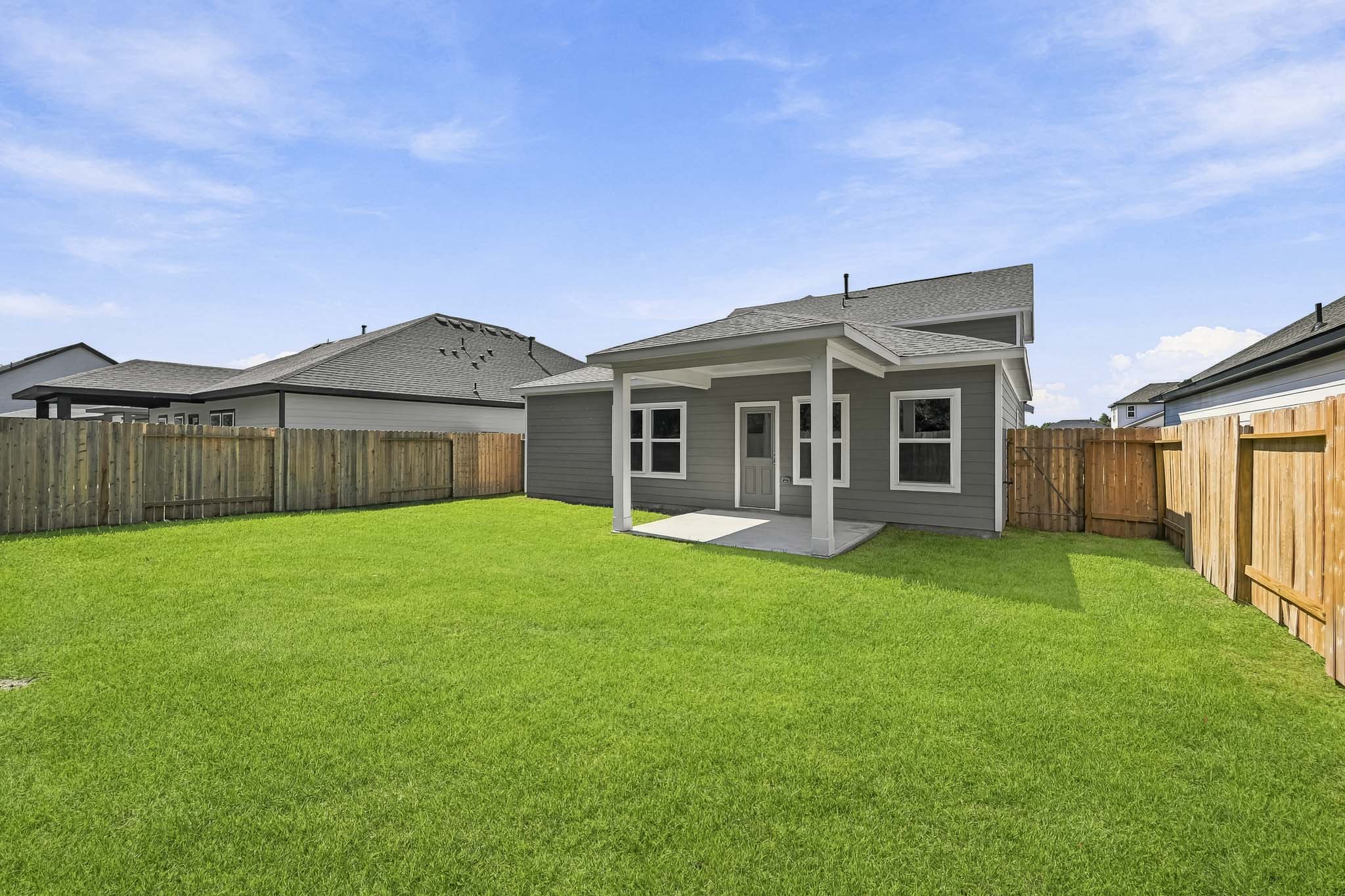 A house with a fence around it.