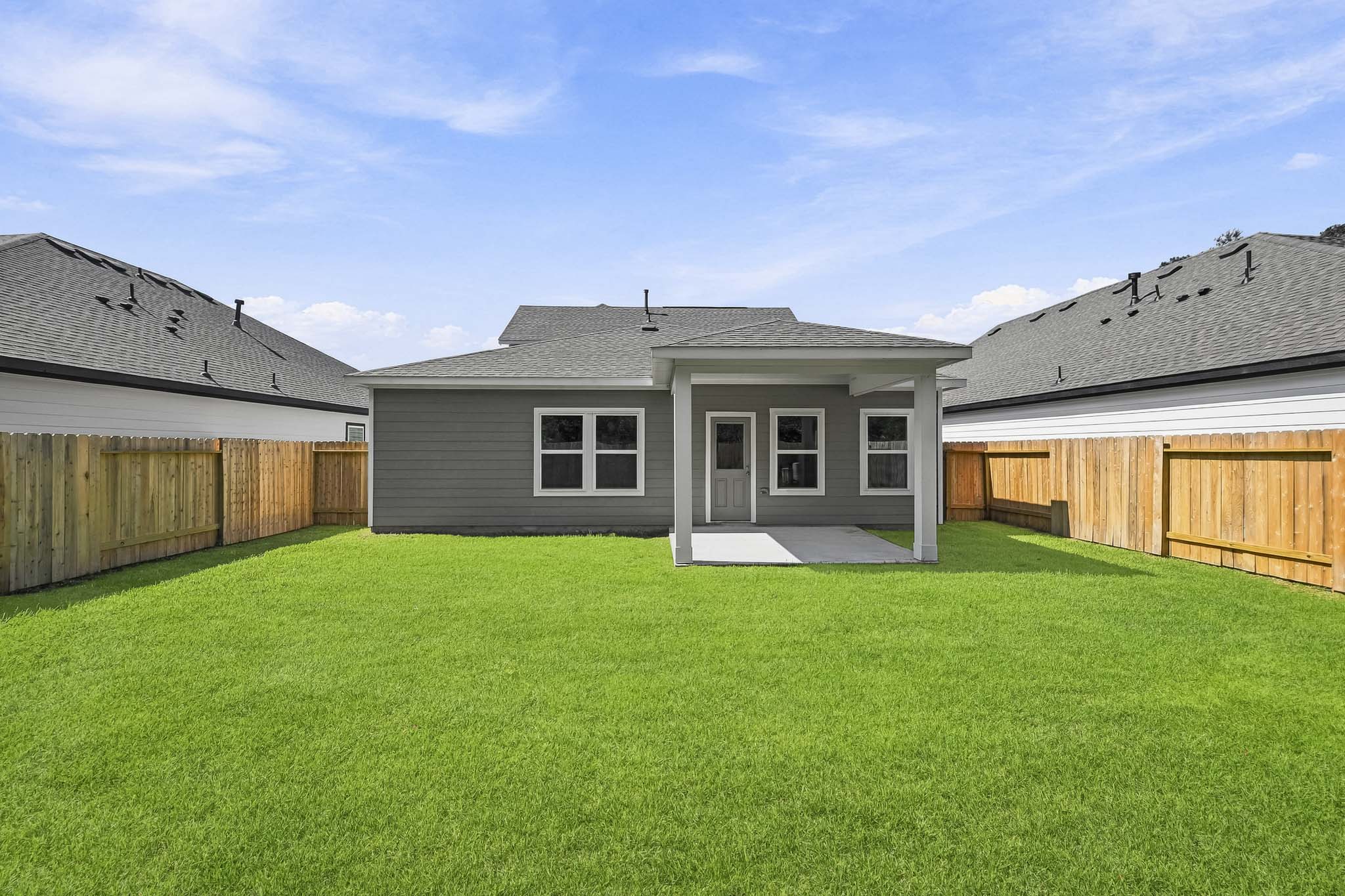 A house with a fence around it.
