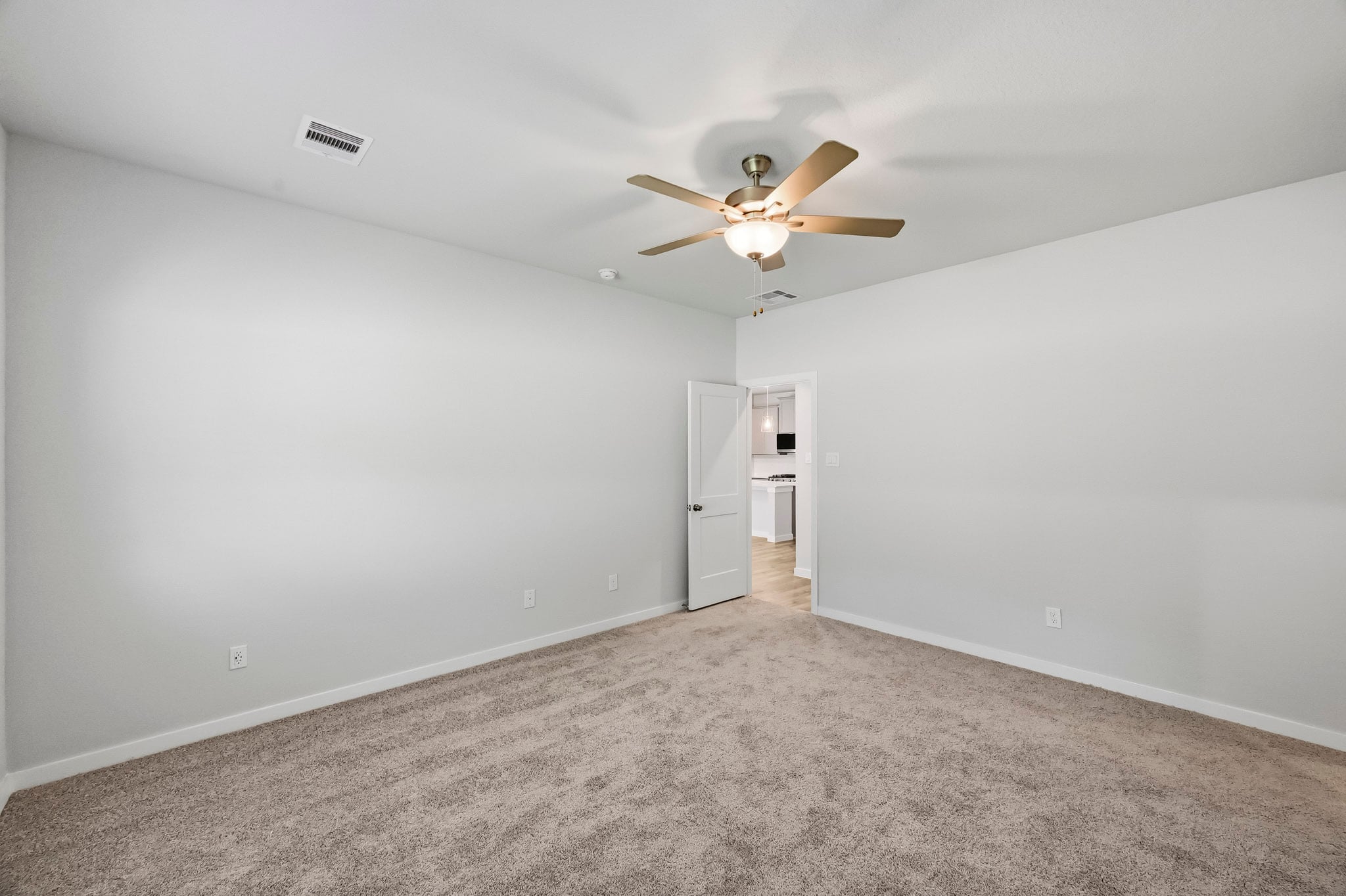 A ceiling fan in a room.
