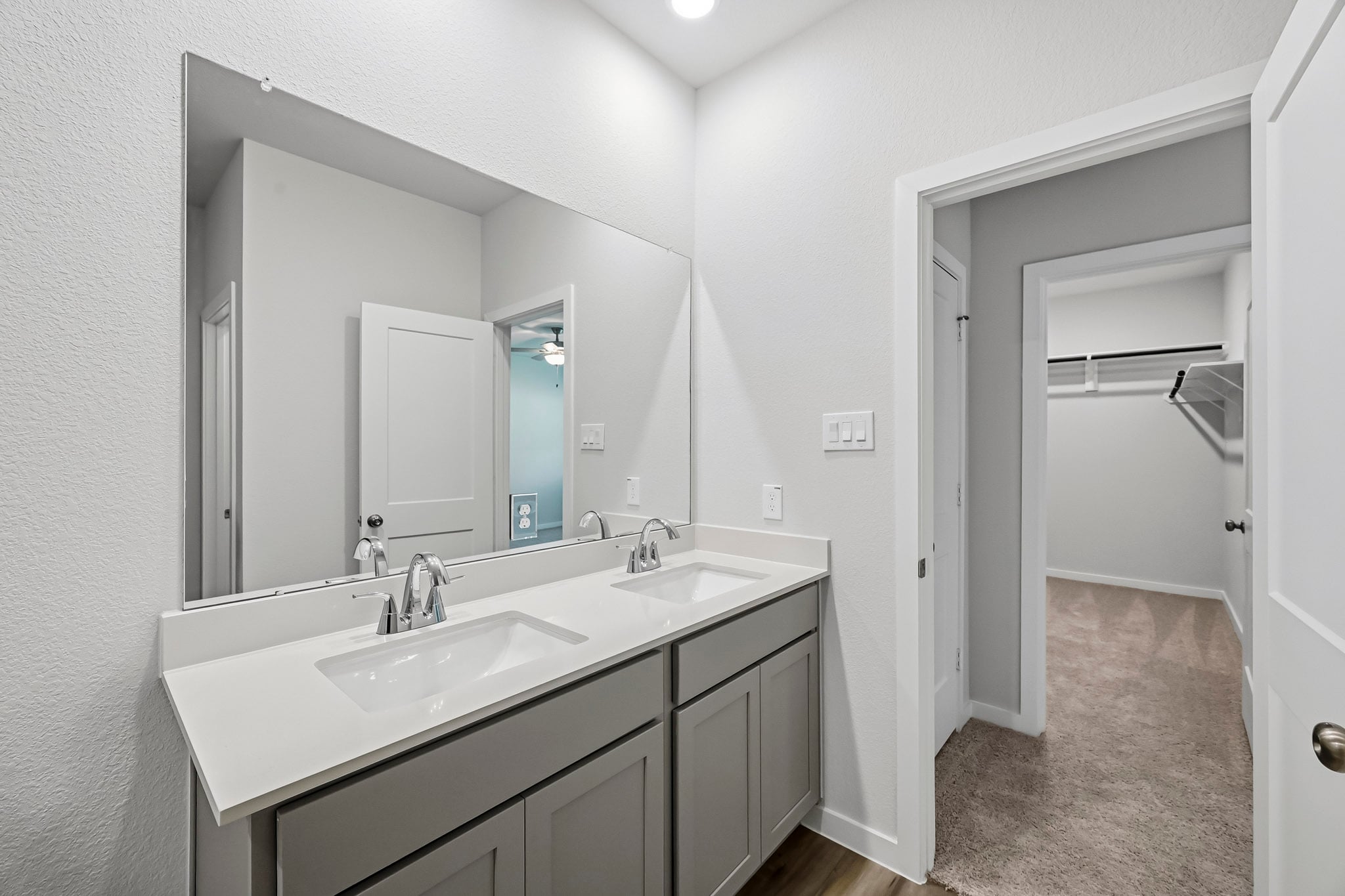 A bathroom with two sinks.