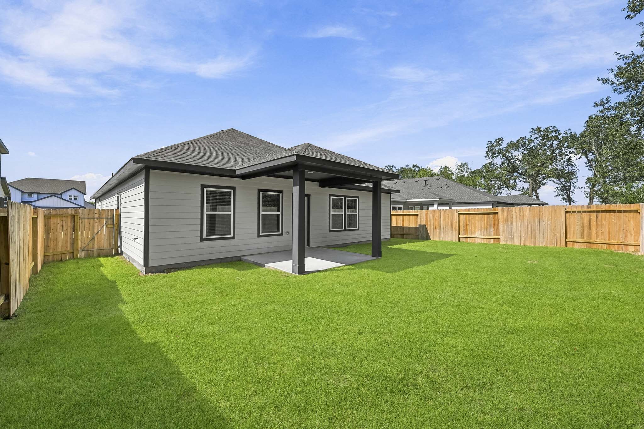 A house with a fence around it.