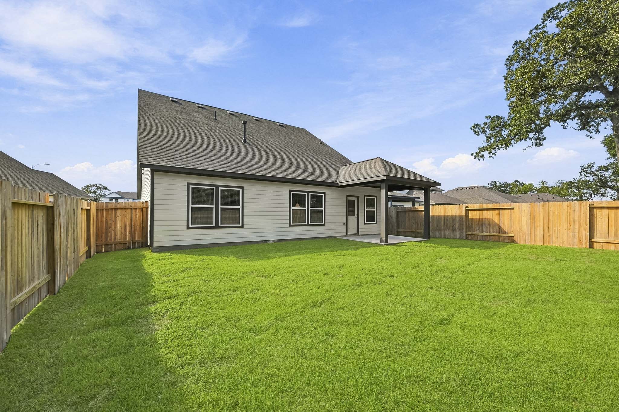 A house with a fence around it.
