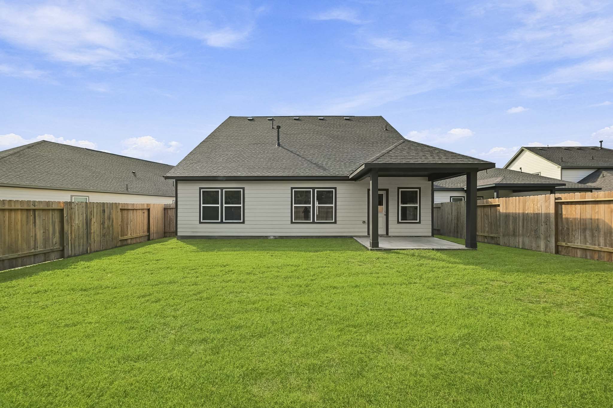 A house with a fence around it.