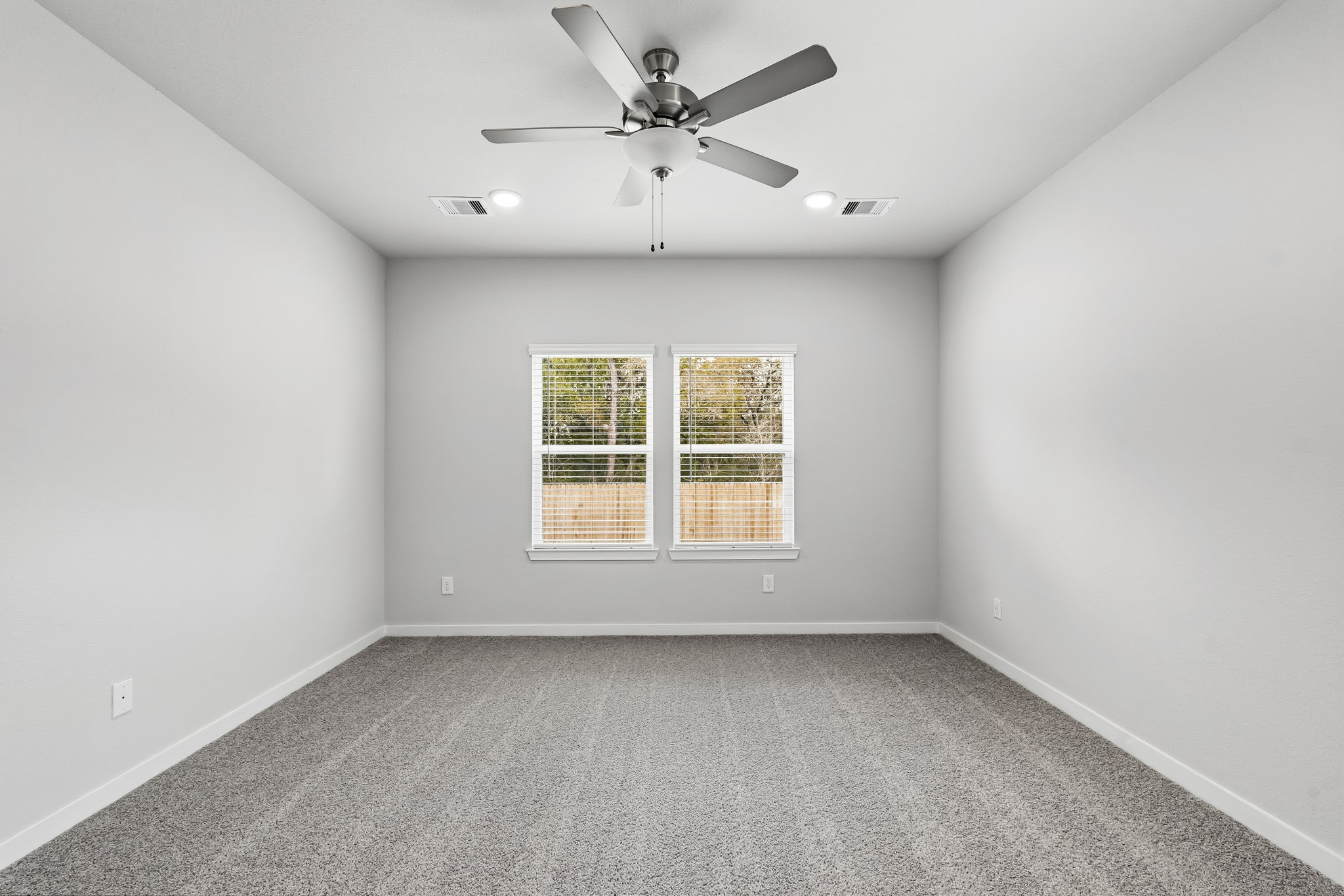 A ceiling fan in a room.