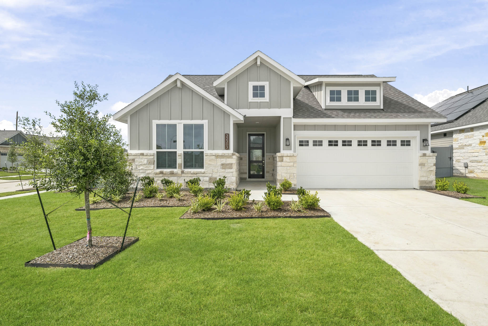 A house with a large front yard.