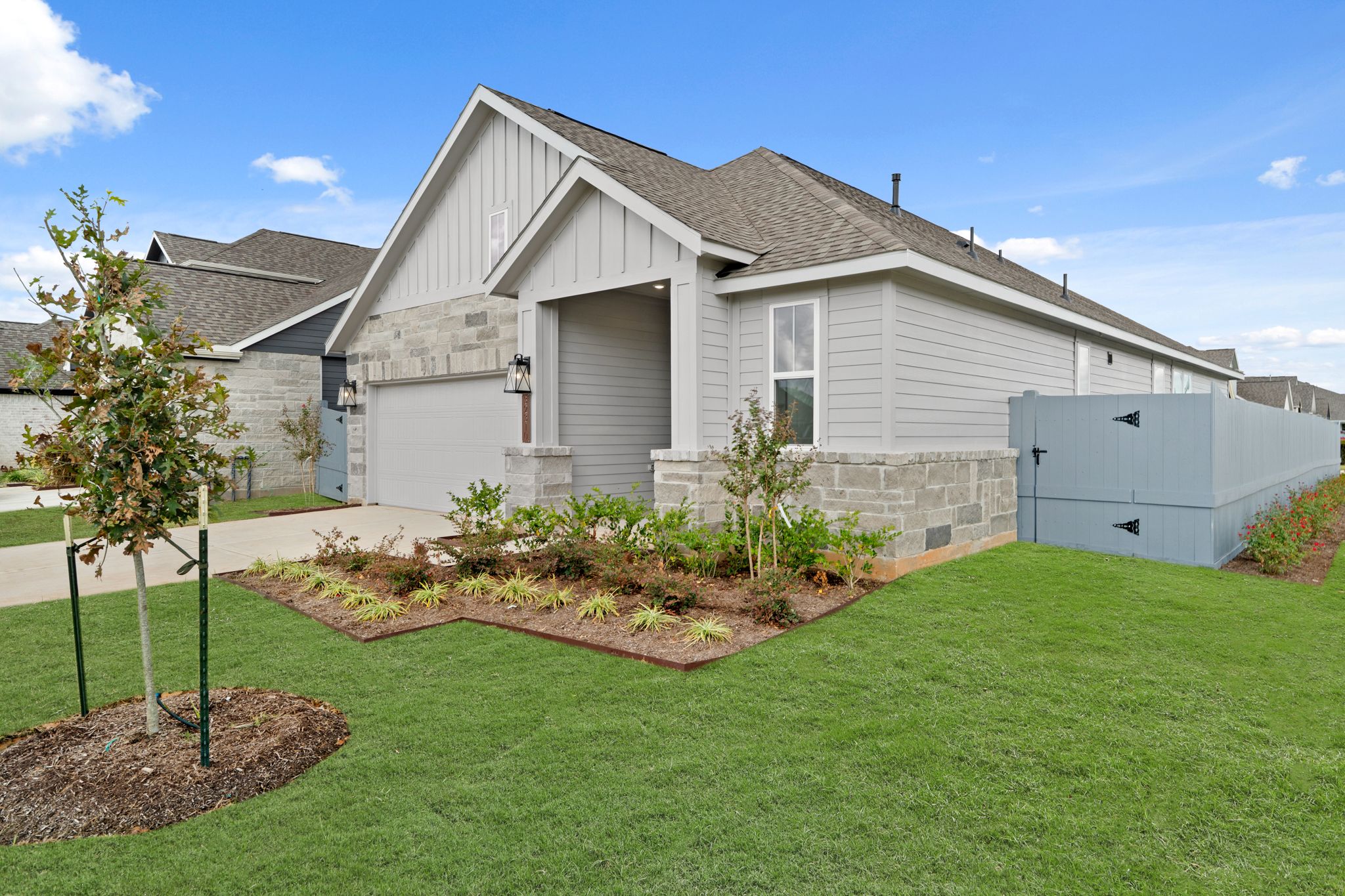 A house with a green lawn.