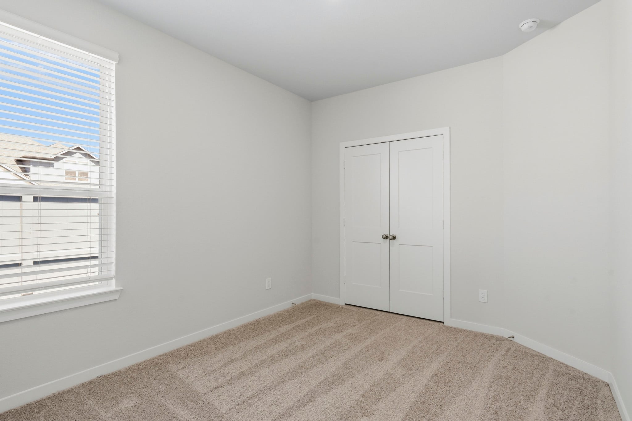A room with white doors.