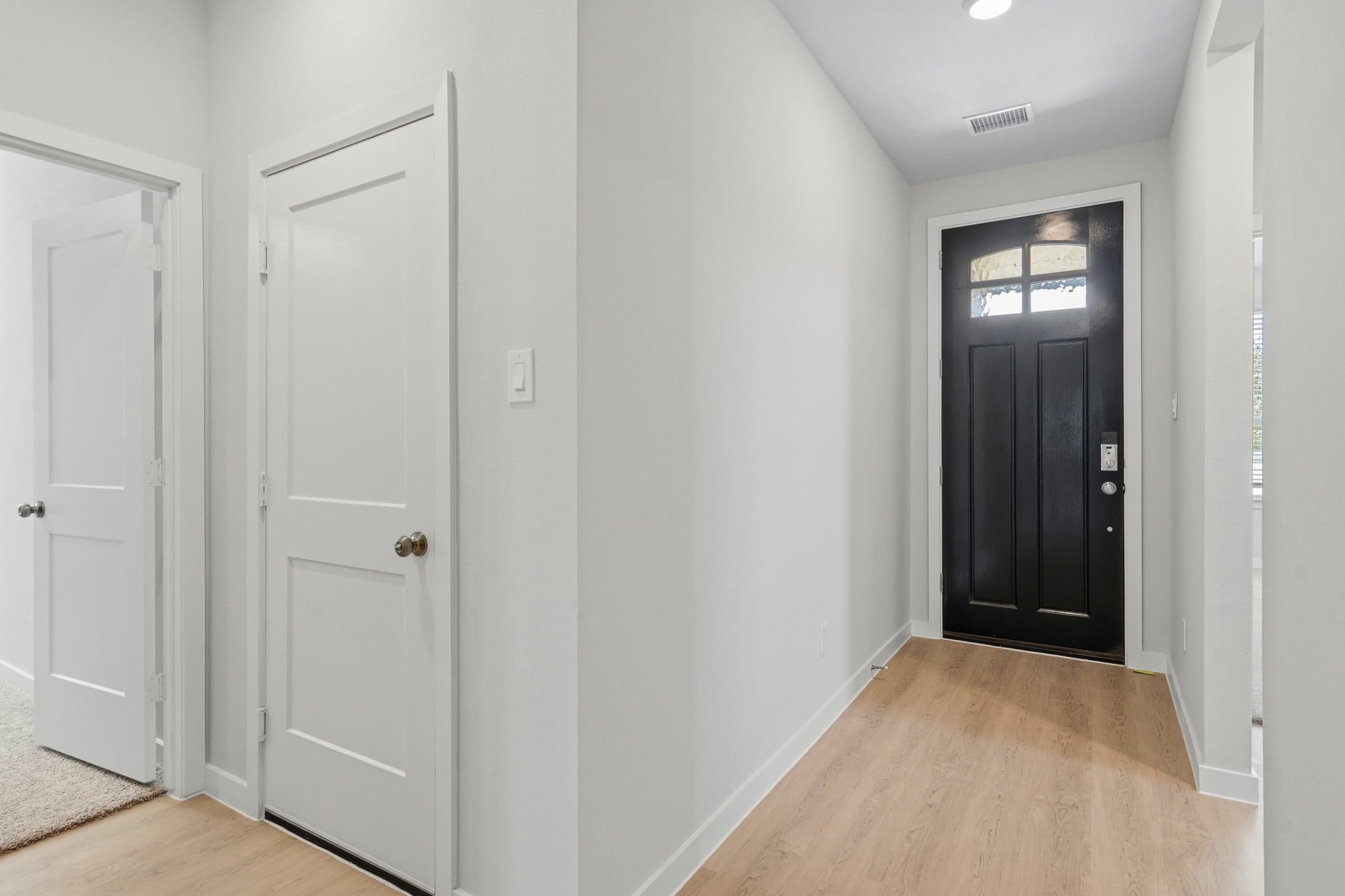 A room with white doors.