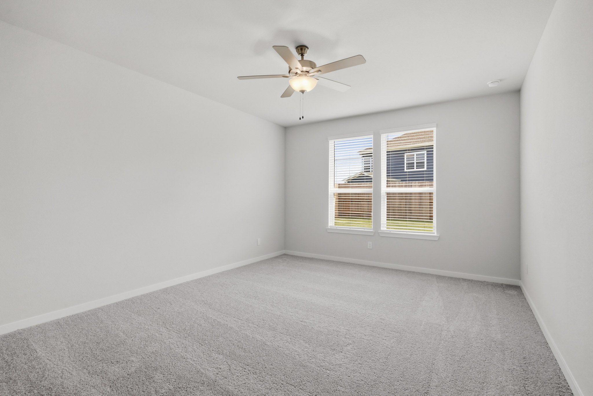 A ceiling fan in a room.