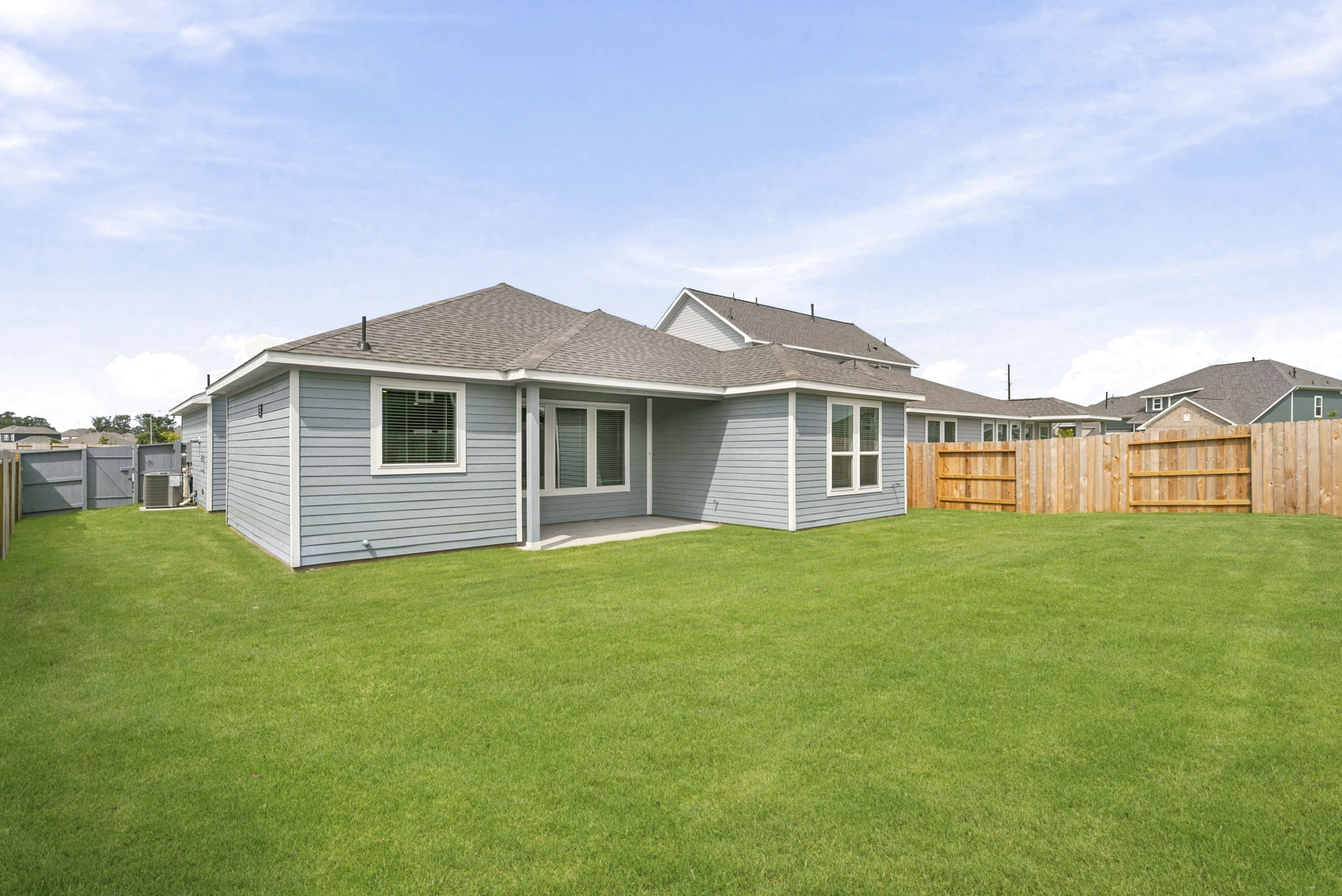 A house with a fence around it.