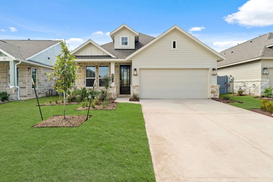 A house with a driveway.