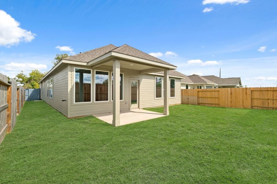 A house with a fence around it.