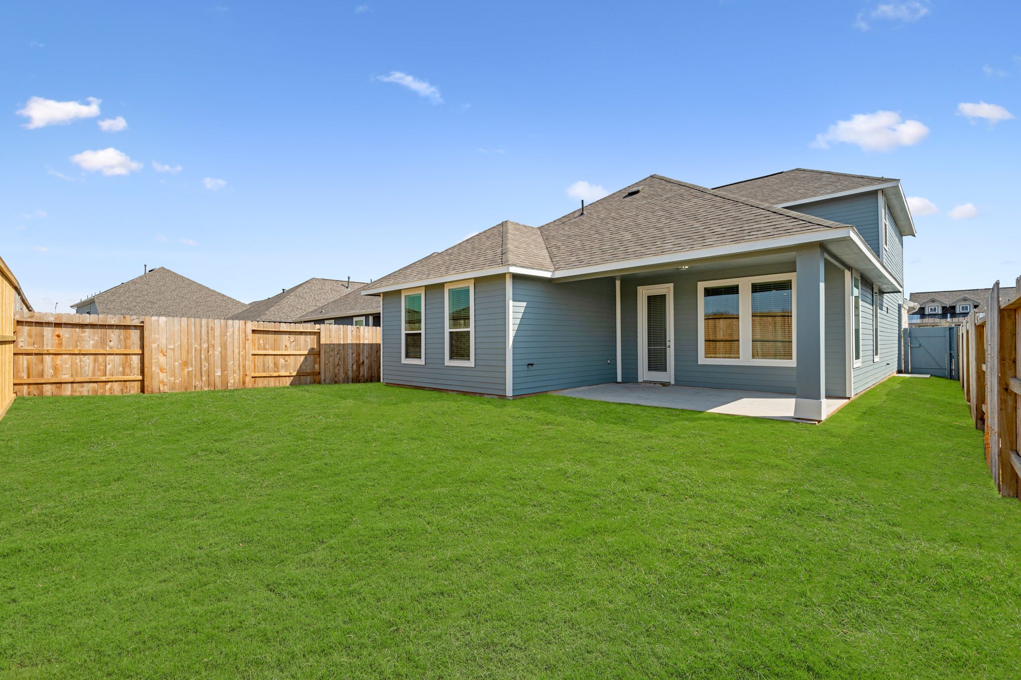 A house with a fence around it.