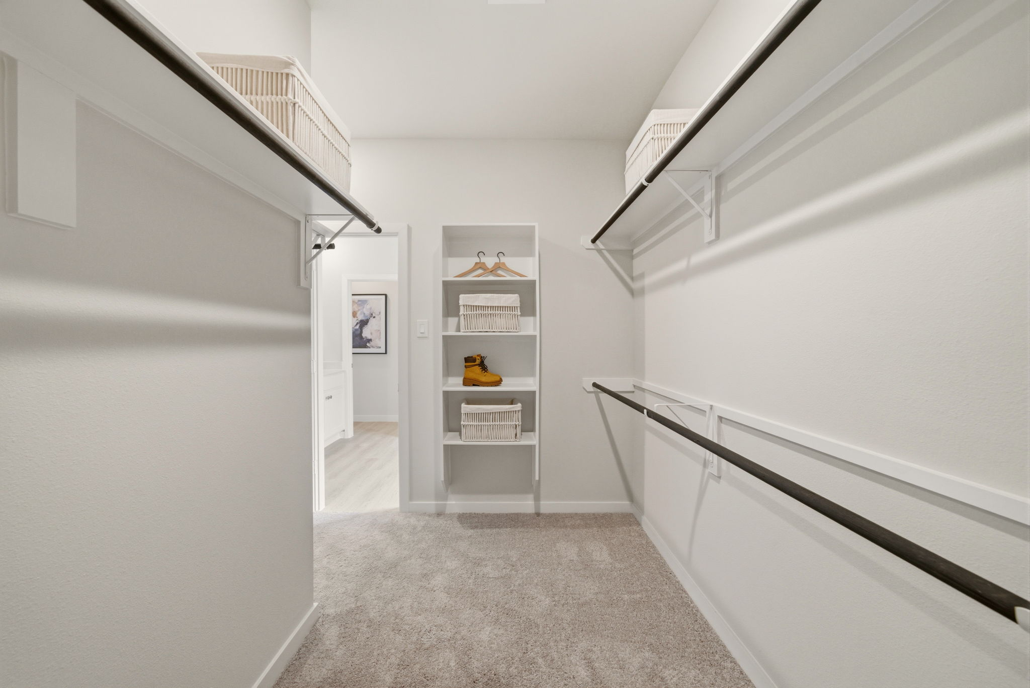 A hallway with white walls.