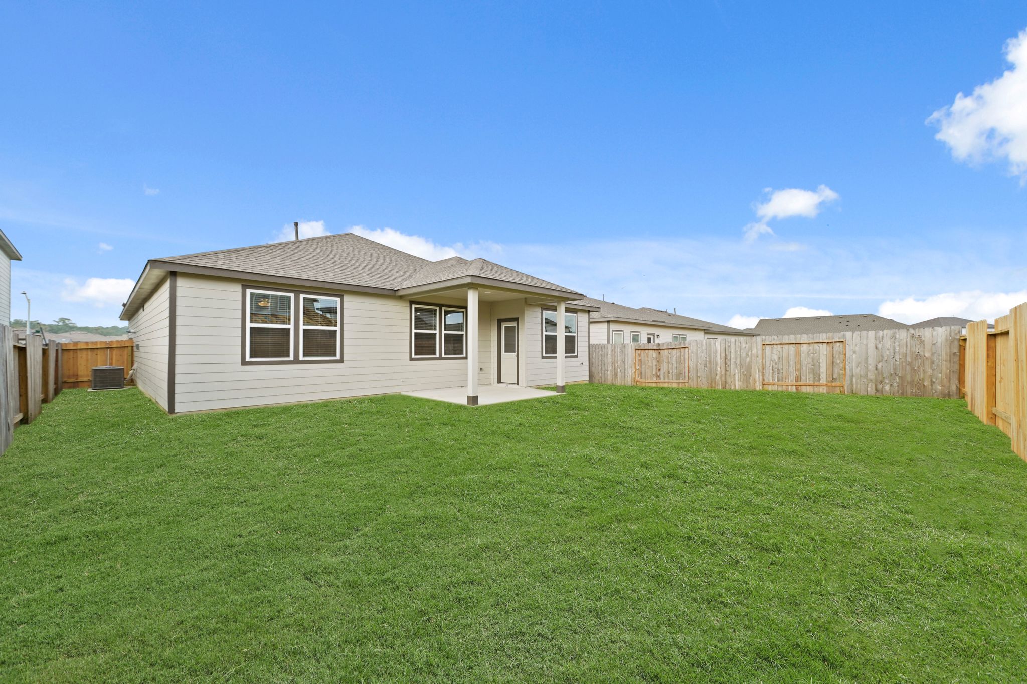 A house with a fence around it.