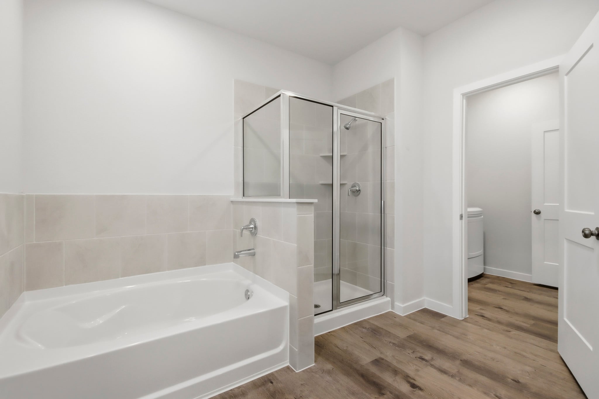 A bathroom with a glass shower.