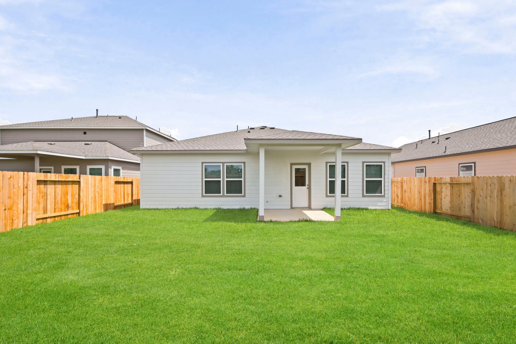 A house with a fence around it.