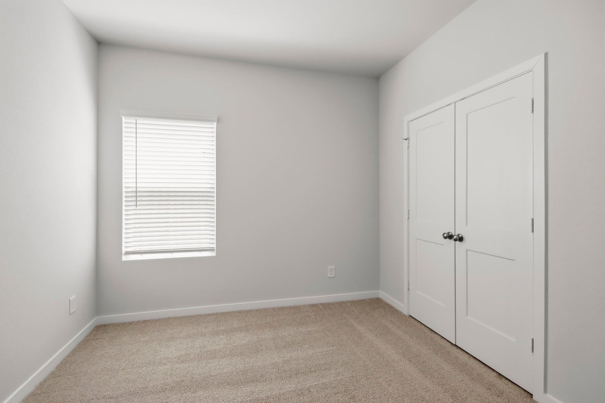 A room with white doors.
