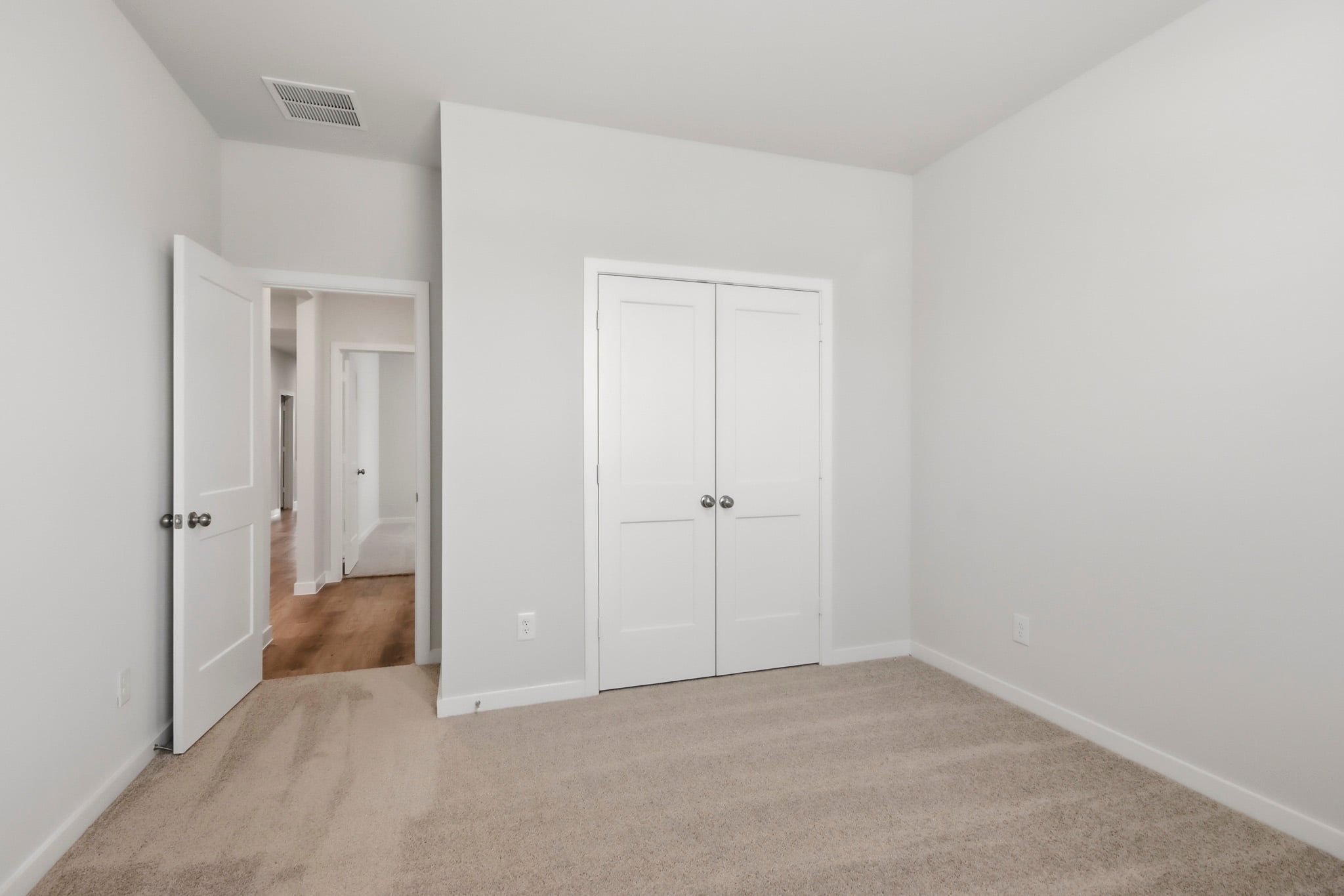 A room with white doors.