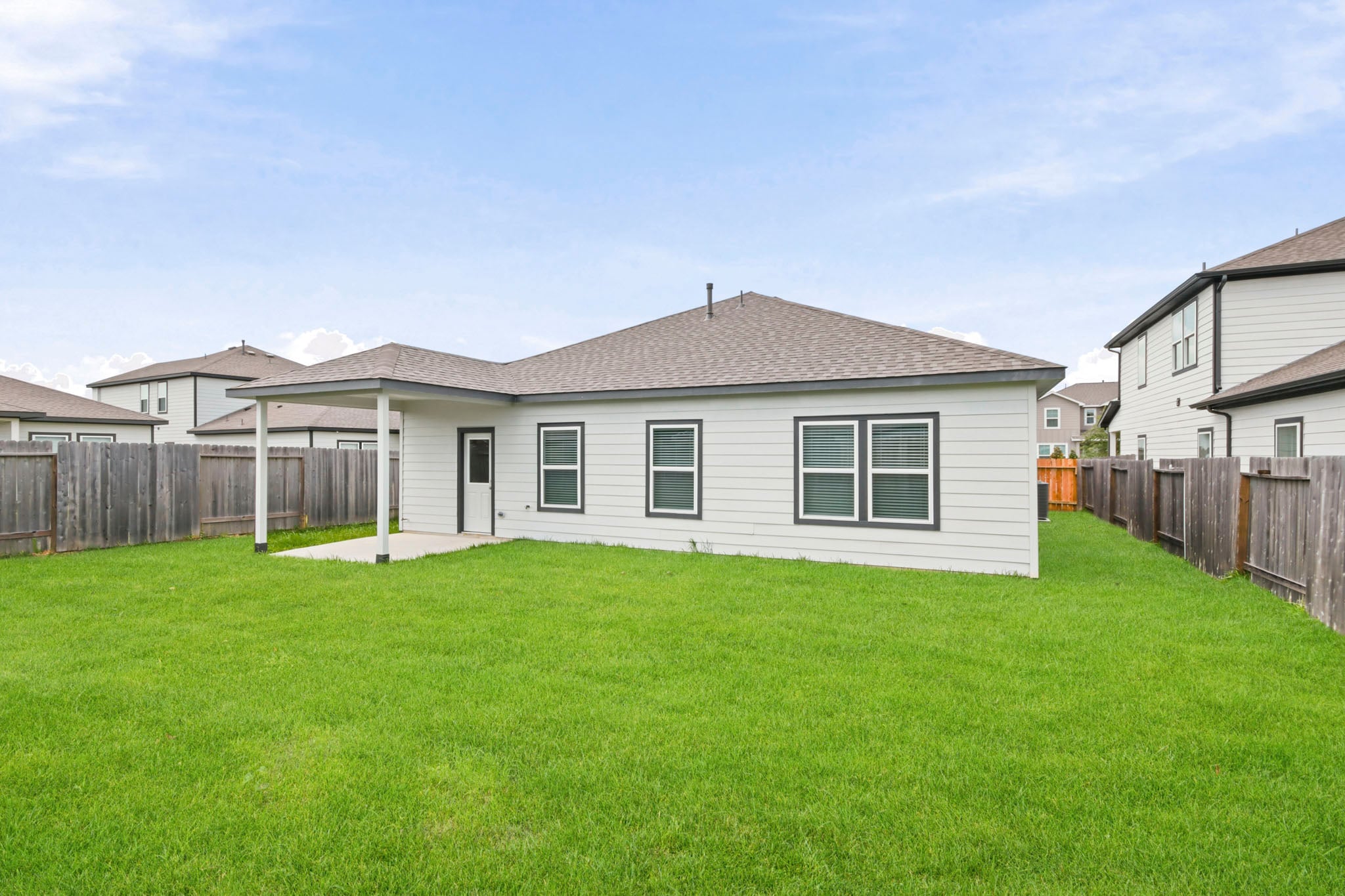 A house with a fence around it.