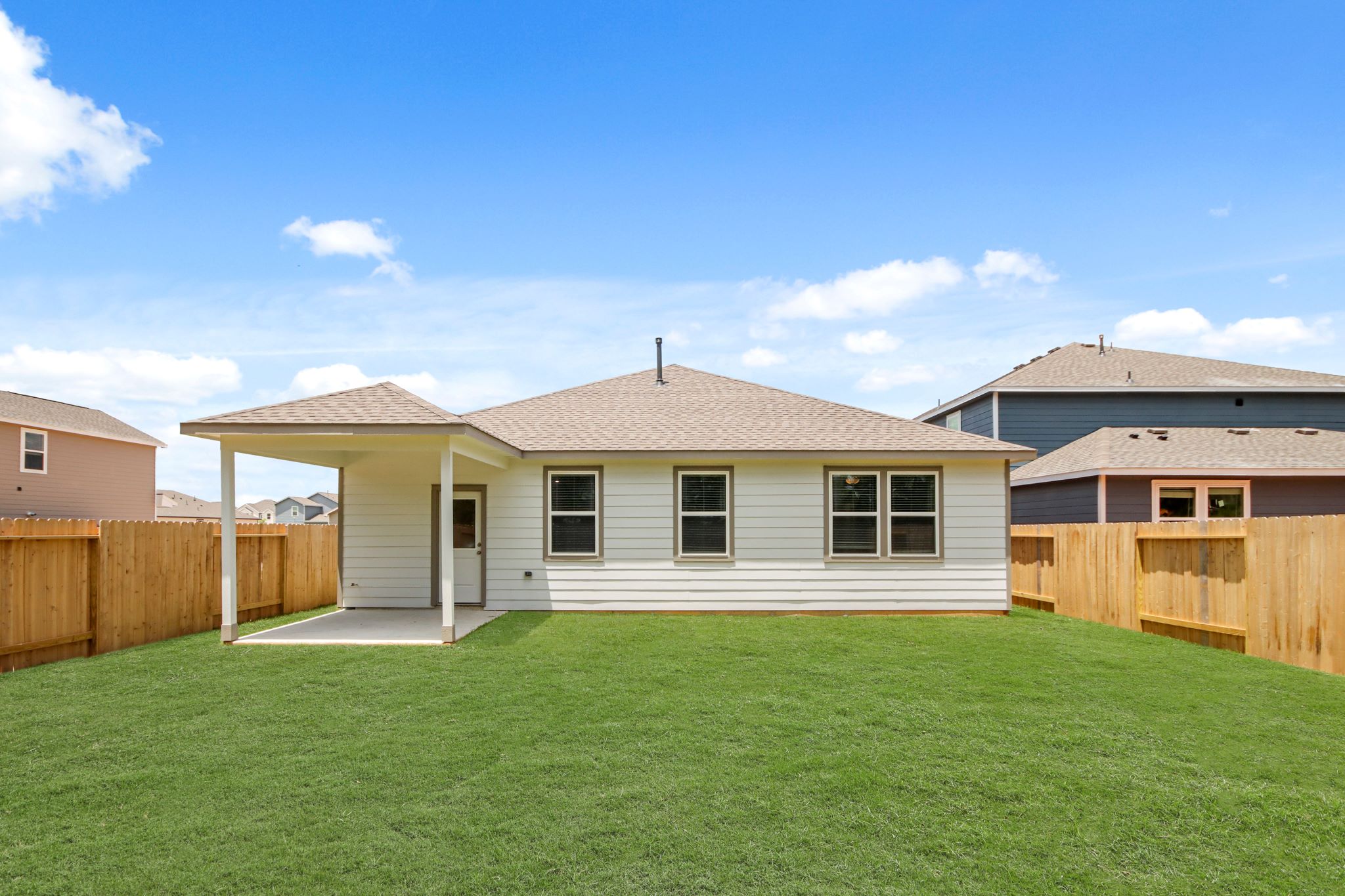 A house with a fence around it.
