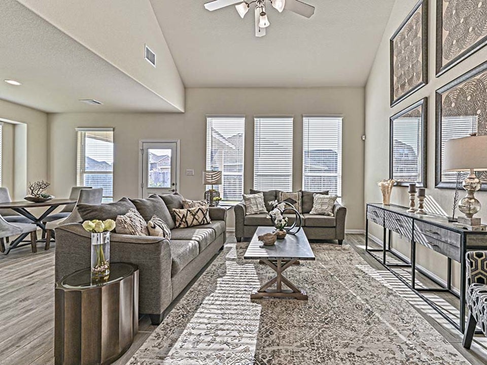 A living room with a couch and coffee table.