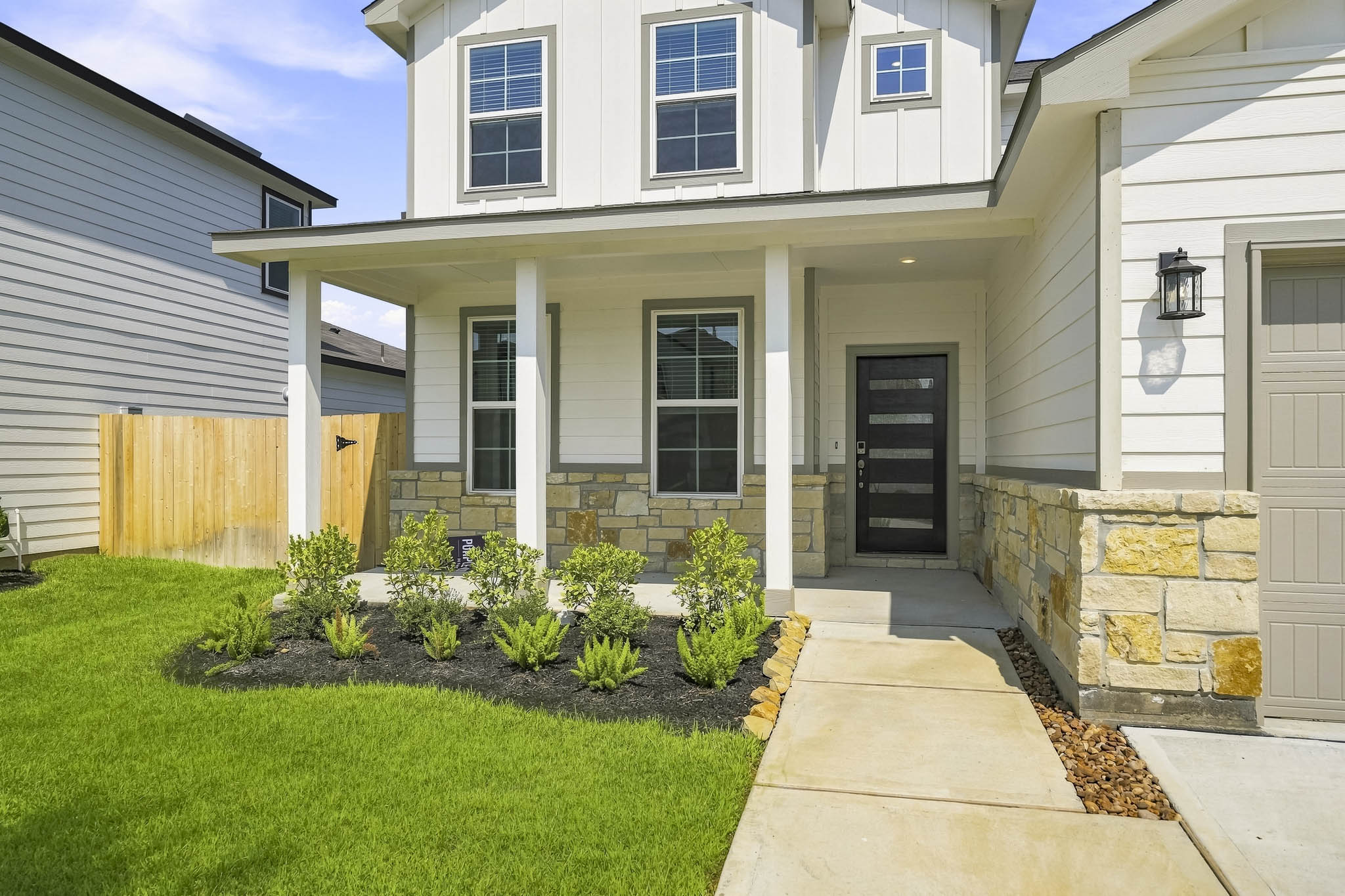 A house with a front yard.